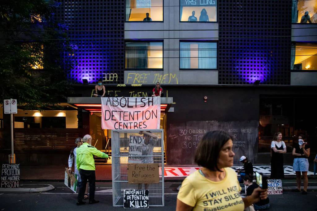 Activists in support of the refugees gather outside Park Hotel where 45 refugees are detained in Melbourne, Australia on Jan. 6, 2022. (Diego Fedele/Getty Images)
