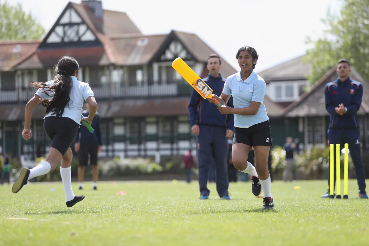 Girls participate in a game of cricket in England on May 10, 2018. (Christopher Lee/Getty Images)