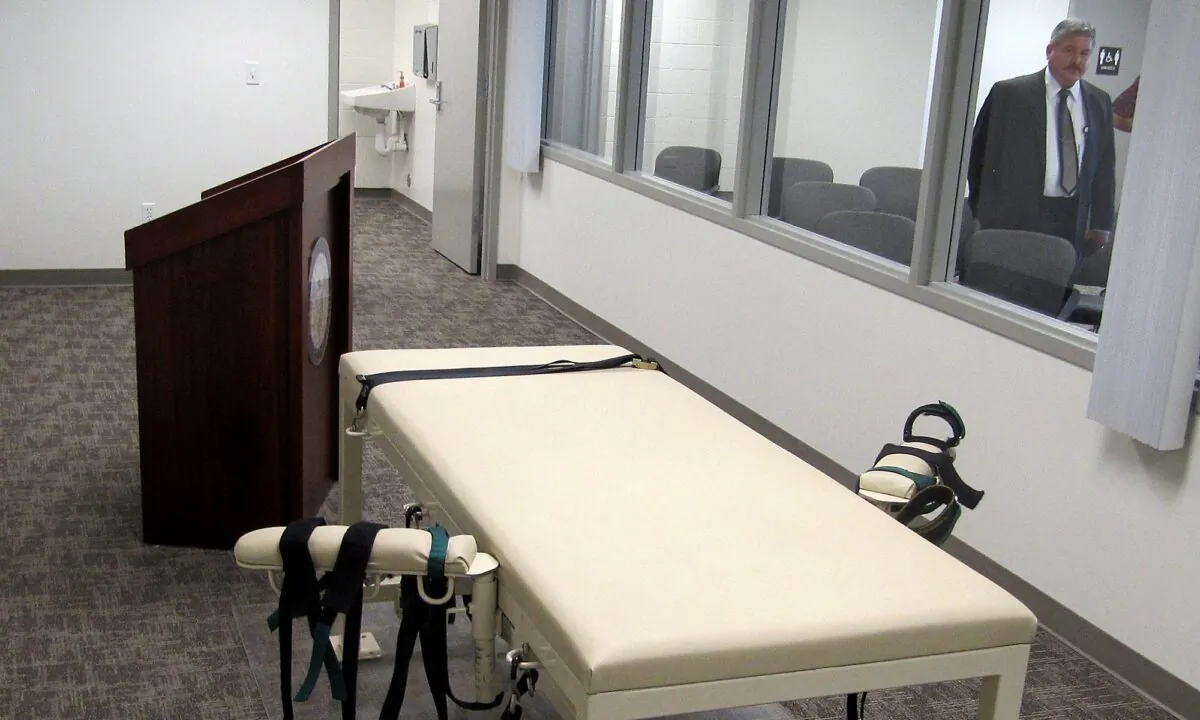 The execution chamber at the Idaho Maximum Security Institution is shown as Security Institution Warden Randy Blades look on in Boise, Idaho, on Oct. 20, 2011. (Jessie L. Bonner/AP Photo)