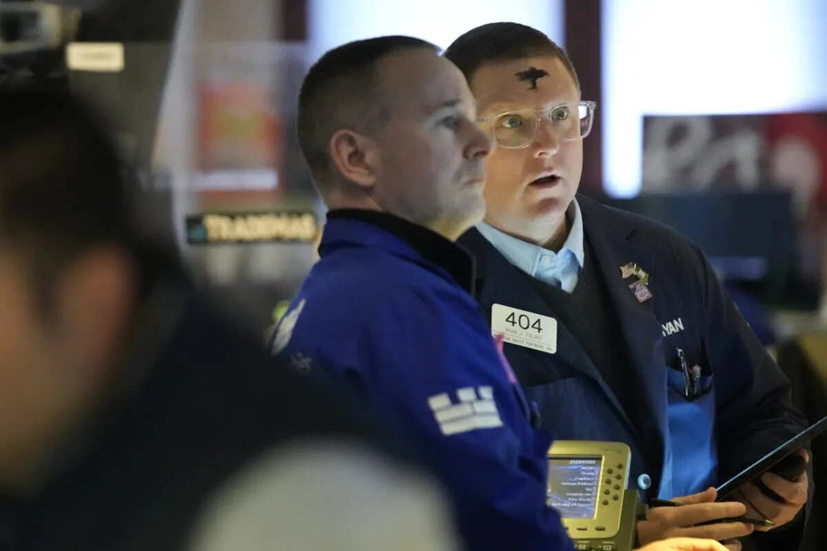 Traders work on the floor at the New York Stock Exchange in New York on Feb. 22, 2023. (Seth Wenig/AP Photo)