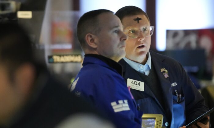 Traders work on the floor at the New York Stock Exchange in New York on Feb. 22, 2023. (Seth Wenig/AP Photo)