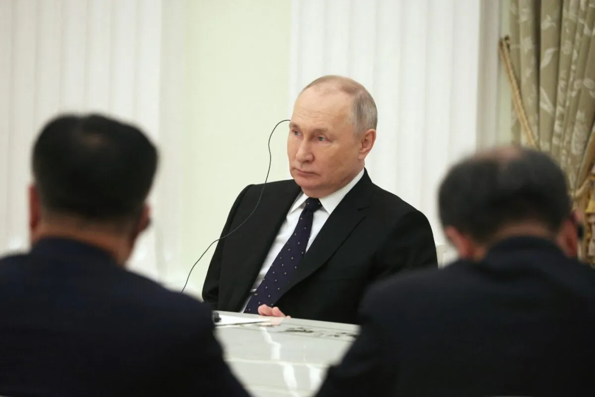 Russia's President Vladimir Putin attends a meeting with China's Director of the Office of the Central Foreign Affairs Commission Wang Yi in Moscow, Russia Feb. 22, 2023. (Sputnik/Anton Novoderezhkin/Pool via Reuters)