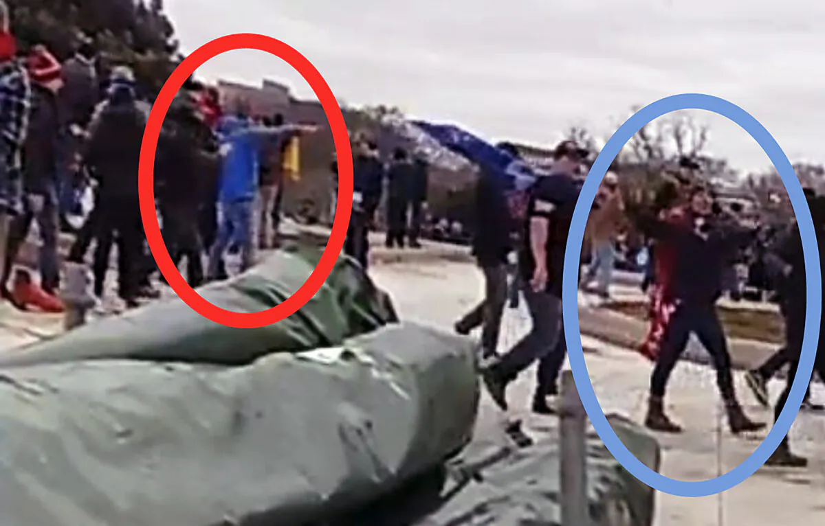 Two undercover Metropolitan Police Department officers (red circle) follow Ashli Babbitt (blue circle) up the northwest stairs of the U.S. Capitol on Jan. 6, 2021. (William Pope via U.S. District Court/Screenshot via The Epoch Times)