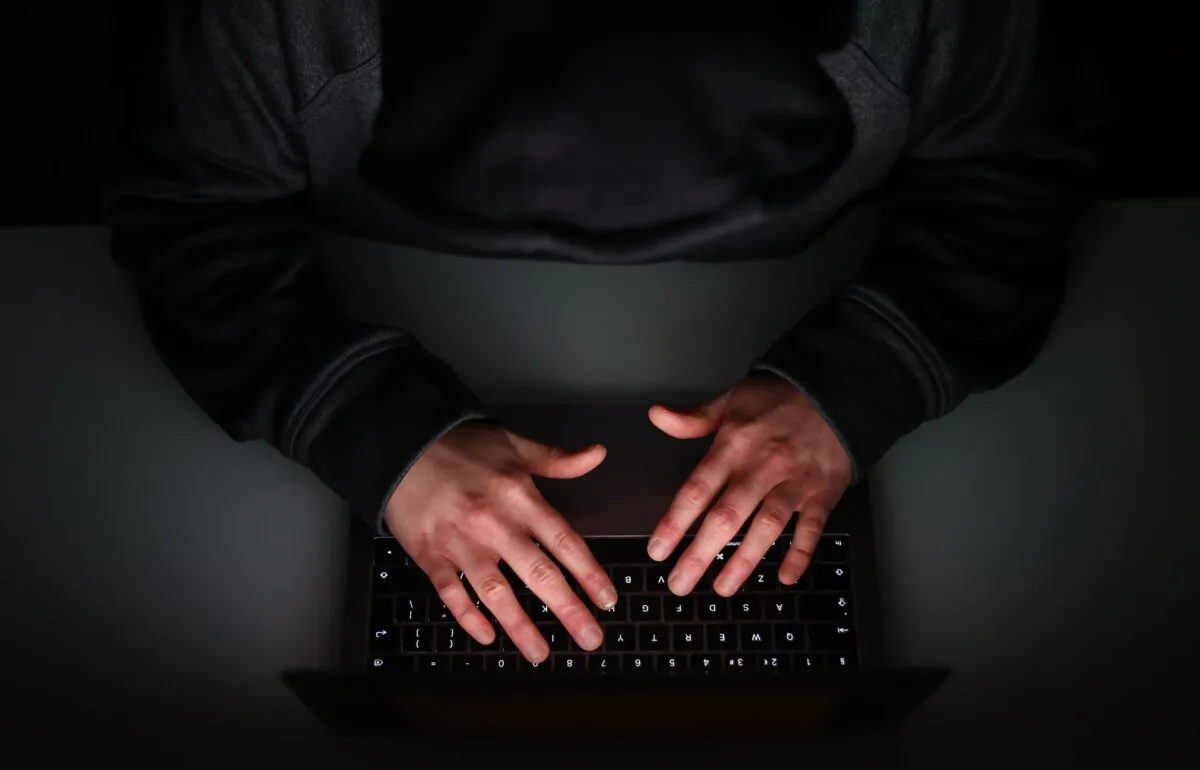 A man uses a laptop at an undisclosed location in England on March 30, 2020. (PA)