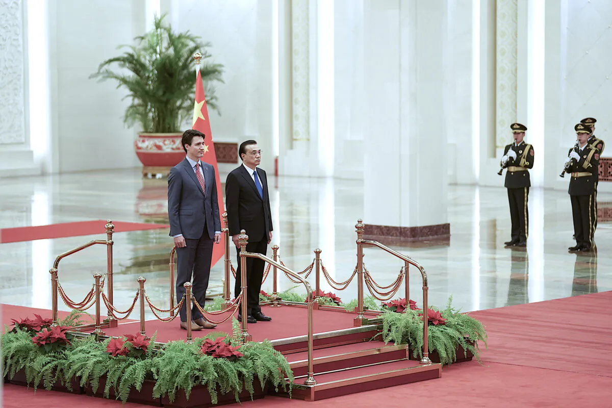 Canadian Prime Minister Justin Trudeau and Chinese Premier Li Keqiang during a welcoming ceremony inside the Great Hall of the People in Beijing on Dec. 4, 2017. (Lintao Zhang/Getty Images)