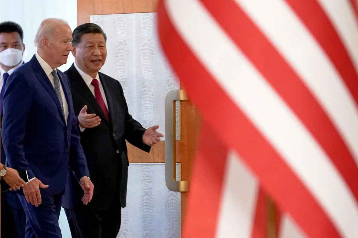 U.S. President Joe Biden meets with Chinese President Xi Jinping on the sidelines of the G20 leaders' summit in Bali, Indonesia, Nov. 14, 2022. (REUTERS/Kevin Lamarque)