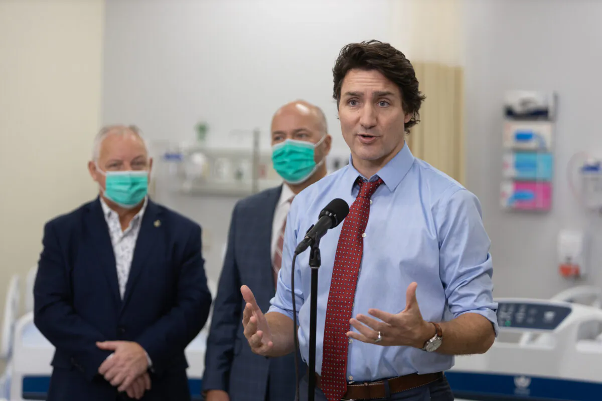 Prime Minister Justin Trudeau answers questions at a scrum with press in Halifax, N.S., on Feb. 23, 2023. (Riley Smith/The Canadian Press)