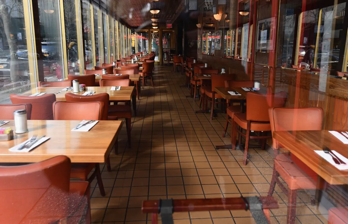 View of an empty restaurant named “Juniors” is seen in the Brooklyn Borough of New York City on March 16, 2020. (Angela Weiss/AFP via Getty Images)