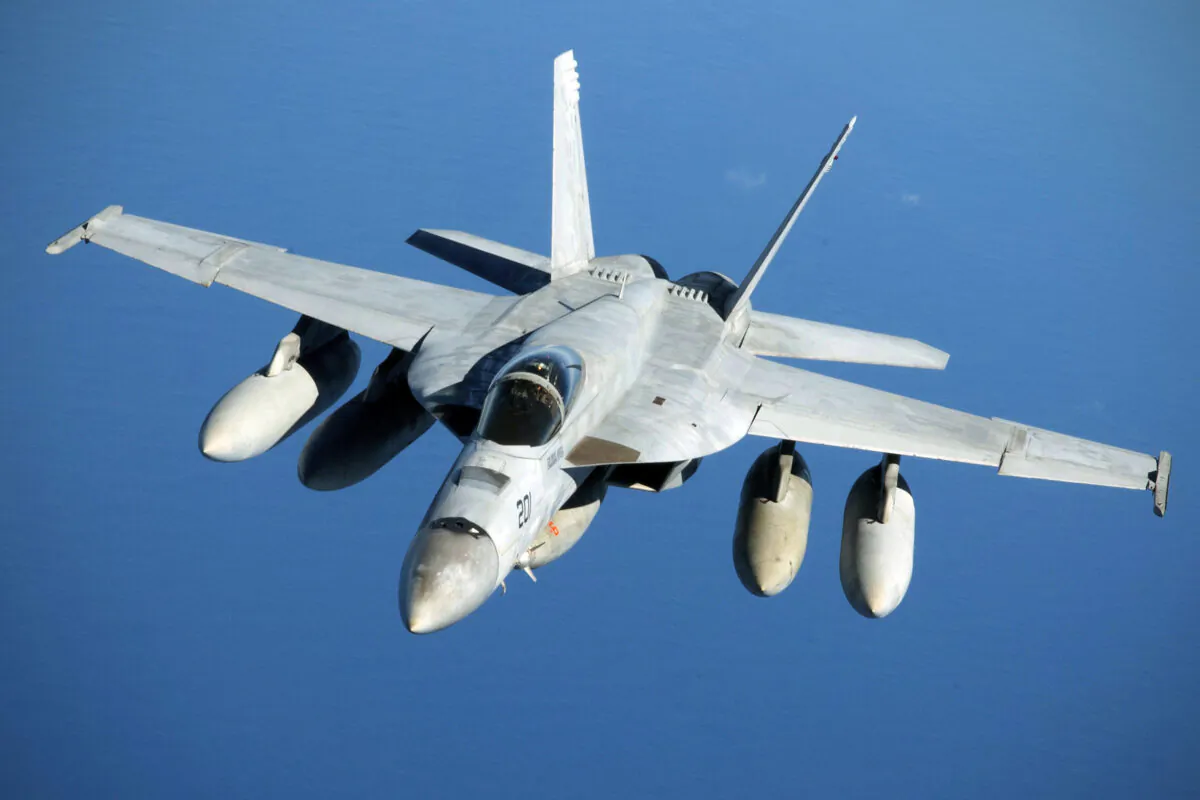 A Navy F/A-18 Super Hornet in flight after refueling over the Pacific Ocean near the coast of Brisbane, Australia, on July 17, 2019. (Senior Airman Elora J. Martinez/U.S. Air Force via AP)