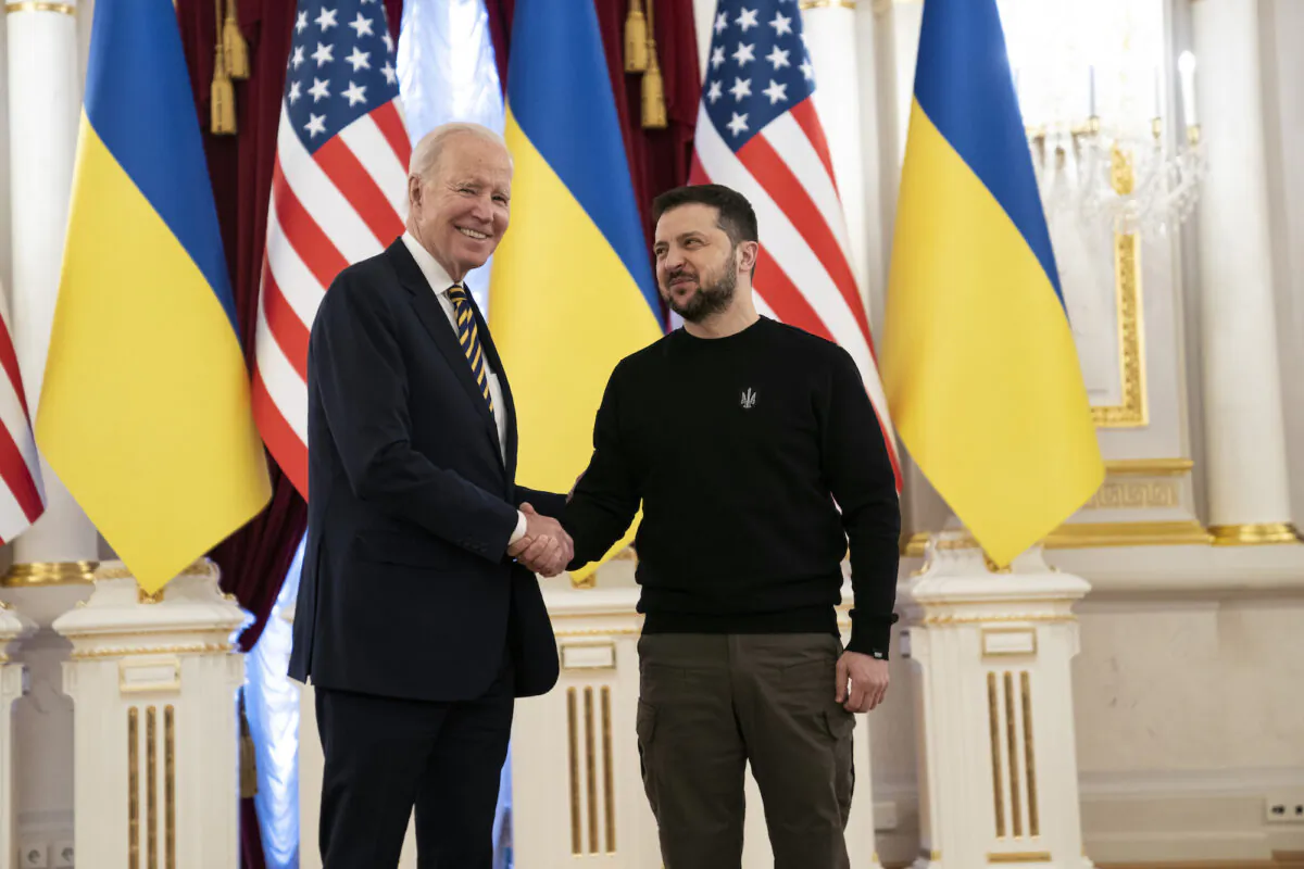 President Joe Biden (L) shakes hands with Ukrainian President Volodymyr Zelenskyy at Mariinsky Palace during a visit in Kyiv, Ukraine, on Feb. 20, 2023. (Evan Vucci/Pool/AP Photo)