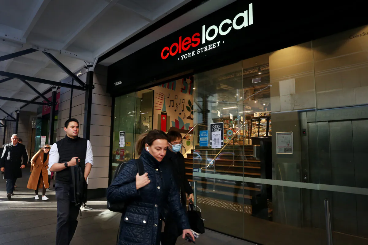 Pedestrians walk past a Coles supermarket in Sydney, Australia, on Aug. 24, 2022. (Lisa Maree Williams/Getty Images)