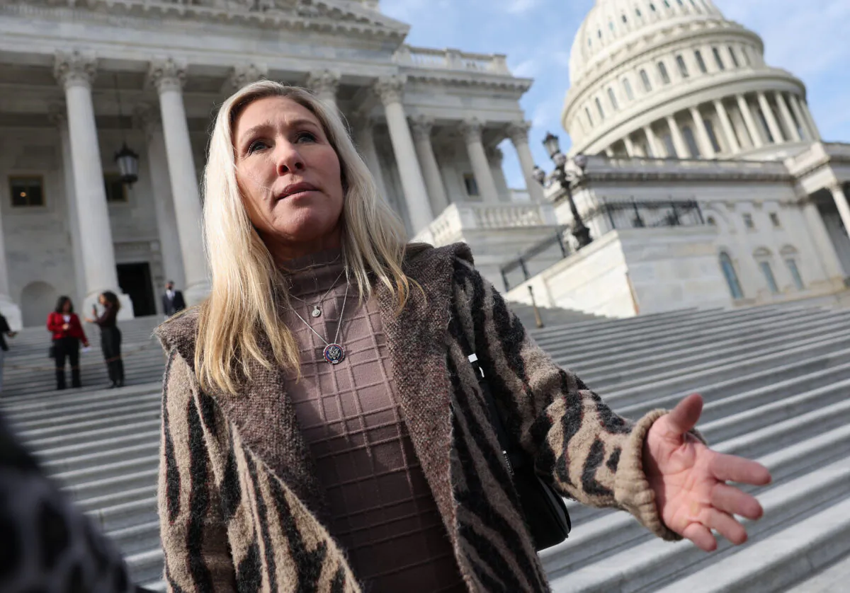 Rep. Marjorie Taylor Greene (R-Ga.) talks to reporters as she leaves the U.S. Capitol in Washington on Feb. 2, 2023. (Kevin Dietsch/Getty Images)