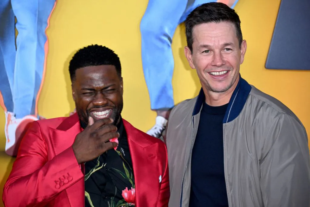 US actor and comedian Kevin Hart (L) and actor Mark Wahlberg arrive for the premiere of "Me Time" at the Regency Village Theatre in Westwood, Los Angeles, California, on August 23, 2022. (ROBYN BECK/AFP via Getty Images)