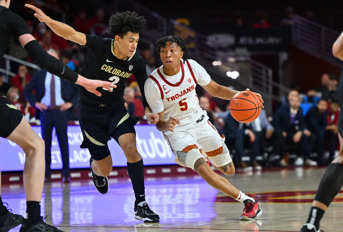 KJ Simpson (2) of the Colorado Buffaloes defends a drive by Boogie Ellis (5) of the USC Trojans in the first half at Galen Center in Los Angeles on Jan. 12, 2023. (Jayne Kamin-Oncea/Getty Images)