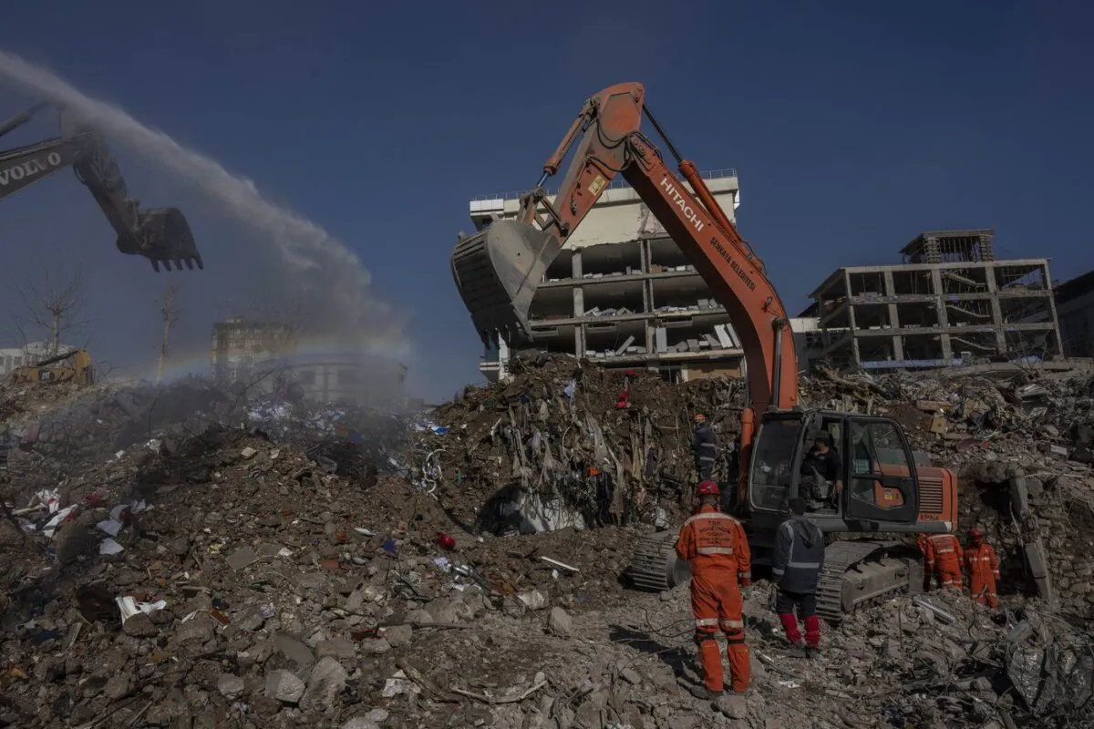 Excavators work at the site of buildings that collapsed during the earthquake in Kahramanmaras, Turkey, Feb. 17, 2023. (The Canadian Press/AP-Bernat Armangue)

