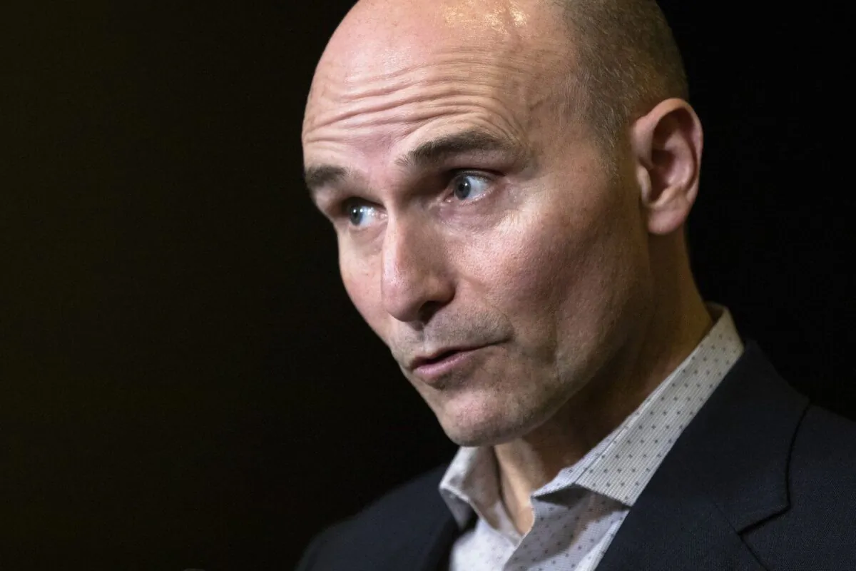 Federal Health Minister Jean-Yves Duclos speaks to the media at the Hamilton Convention Centre, in Hamilton, Ont., during the Liberal cabinet retreat, on Jan. 23, 2023. (The Canadian Press/Nick Iwanyshyn)