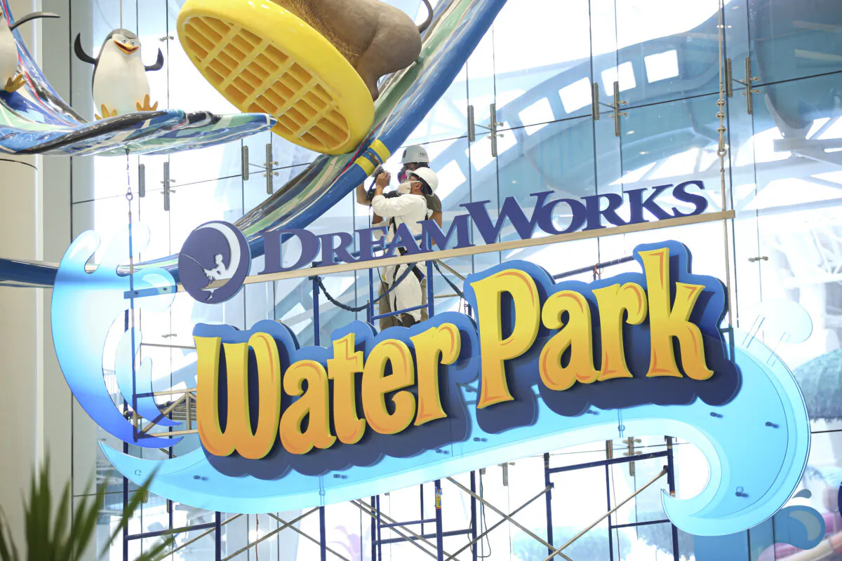 Workers clean the installation of the Dream Works Water park at the American Dream mall located in East Rutherford, N.J., on Dec. 19, 2019. (Kena Betancur/AFP via Getty Images)