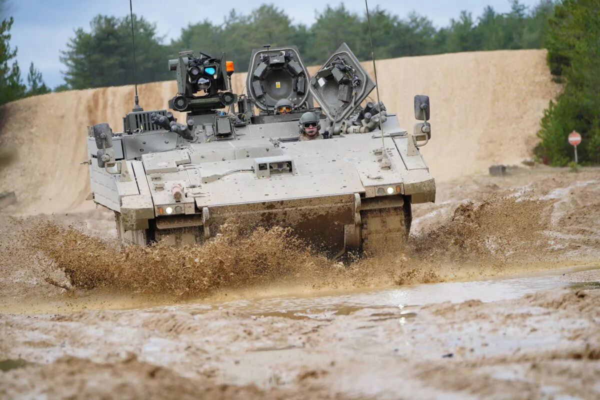 An Ajax Ares tank, an armoured personnel carrier, on the training range at Bovington Camp, a British Army military base in Dorset, England, on Feb. 22, 2023. (Ben Birchall/PA Media)
