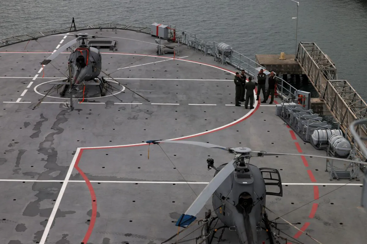 Helicopters of the Brazilian Navy are seen on board the ship Navio Atlantico during relief operations for victims of landslides in Sao Sebastiao, Brazil, on Feb. 23, 2023. (Roosevelt Cassio/Reuters)
