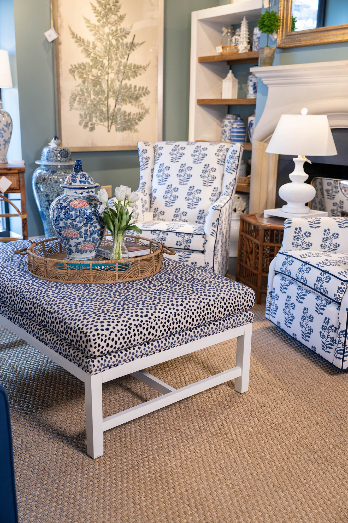 Ottomans are a great source of texture in a room, like this blue and white speckled design.