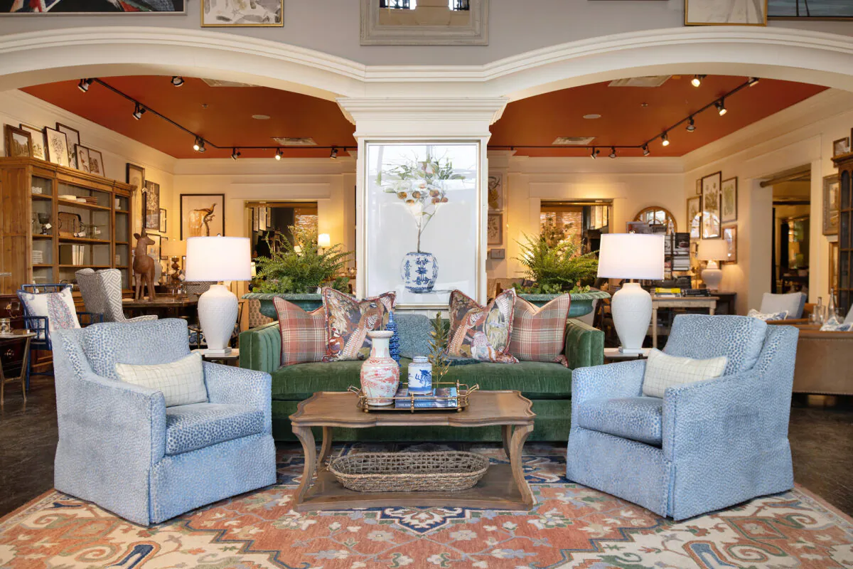 A wooden coffee table enriches the sumptuous color palate of this living room. (Handout/TNS)