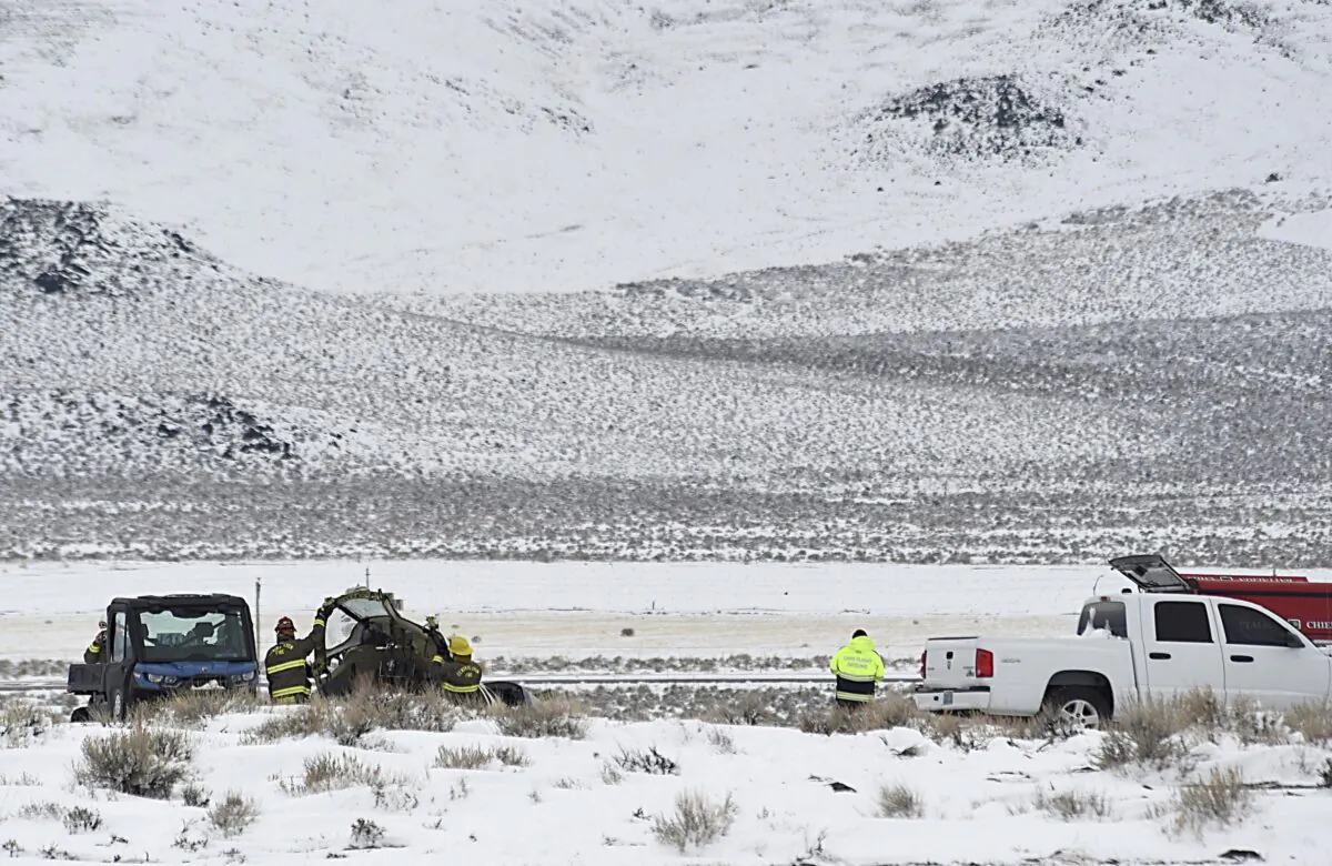 A Care Flight medical transport plane carrying a patient and four others that crashed the day before is seen in Lyon County, Nev., on Feb. 25, 2023. (Jason Bean/The Reno Gazette-Journal via AP)