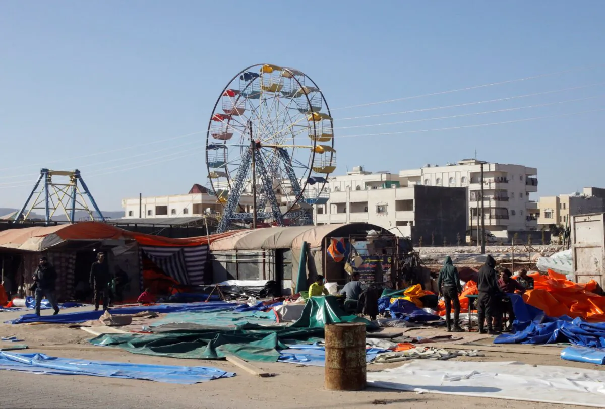 People work at a tent manufacturing workshop in the aftermath of a deadly earthquake in the rebel-held northwestern Syrian city of Azaz, Syria, on Feb. 18, 2023. (Mahmoud Hassano/Reuters)