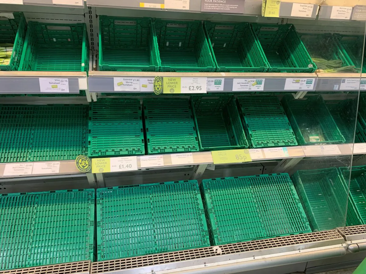 Empty tomato shelves are pictured at a Waitrose supermarket in Maidenhead, Berkshire, on Feb. 25, 2023. (PA Images/Peter Clifton)