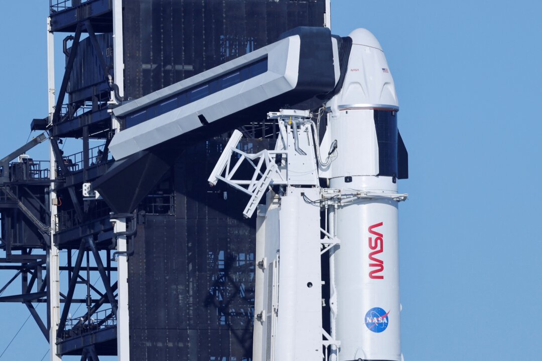 A Falcon 9 rocket is readied before launch on NASA's SpaceX Crew-6 mission to take four crew members to the International Space Station from the Kennedy Space Center in Cape Canaveral, Fla., on Feb. 26, 2023. (Joe Skipper/Reuters)