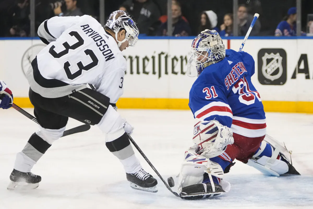 New York Rangers goaltender Igor Shesterkin (31) stops a shot on goal by Los Angeles Kings' Viktor Arvidsson (33) during the first period of an NHL hockey game in New York on Feb. 26, 2023. (Frank Franklin II/AP Photo)