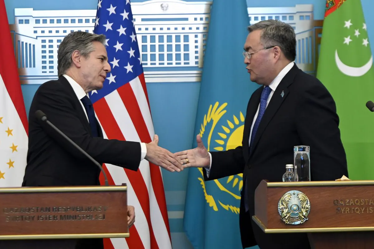 United States Secretary of State Antony Blinken (L) and Kazakhstan's Foreign Minister Mukhtar Tileuberdi go to shake hands at the end of their joint press conference following a U.S.-Central Asia (C5+1) Foreign Ministers meeting at the Ministry of Foreign Affairs in Astana, Kazakhstan, on Feb. 28, 2023. (Olivier Douliery/Pool Photo via AP)