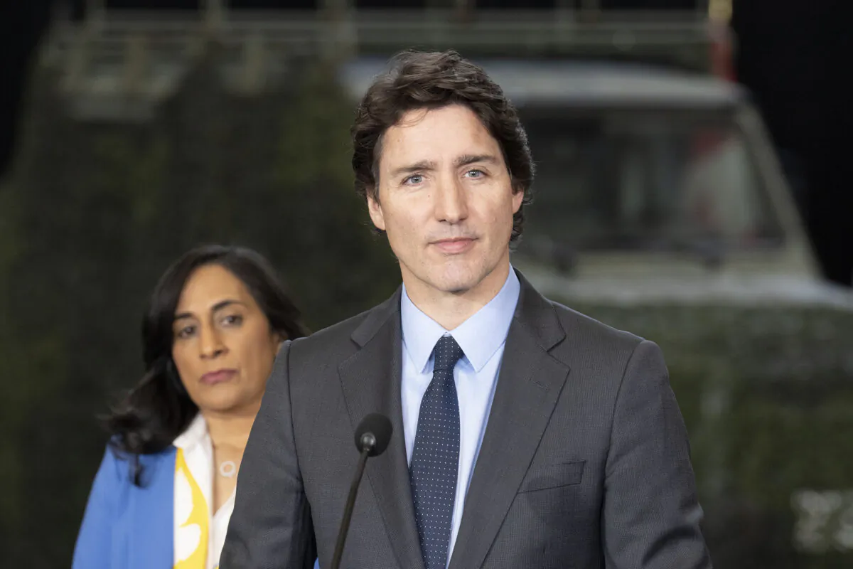 Prime Minister Justin Trudeau stands alongside National Defence Minister Anita Anand in Toronto on Feb. 24, 2023. (Chris Young/The Canadian Press)