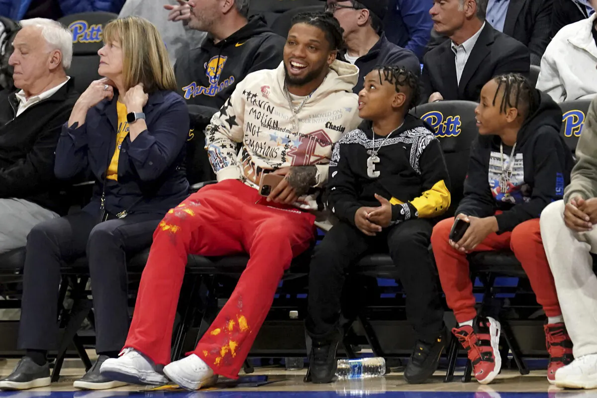 Buffalo Bills safety Damar Hamlin watches as Pittsburgh takes on Georgia Tech during the first half of an NCCA college basketball game in Pittsburgh on Feb. 21, 2023. (Matt Freed/AP Photo)