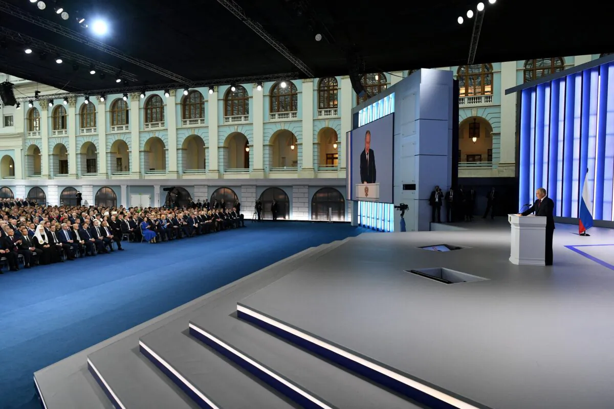 Russian President Vladimir Putin delivers his annual address to the Federal Assembly in Moscow on Feb. 21, 2023. (Sputnik/Maxim Blinov/Kremlin via Reuters)