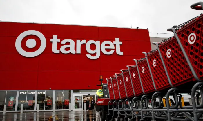 Shoping carts are wheeled outside a Target Store during Black Friday sales in Brooklyn, New York, on Nov. 26, 2021. (Brendan McDermid/Reuters)