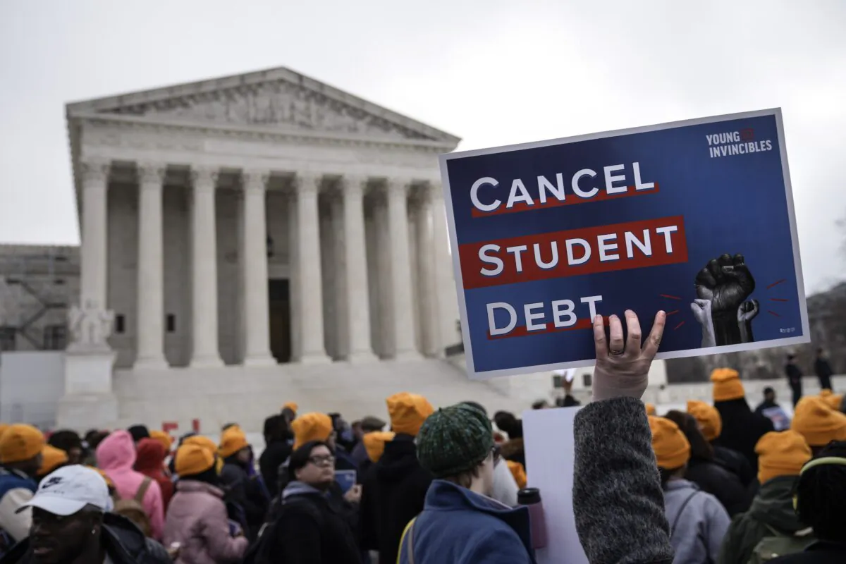 People rally in support of the Biden administration's student debt relief plan in front of the the U.S. Supreme Court in Washington, D.C., on Feb. 28, 2023. (Drew Angerer/Getty Images)