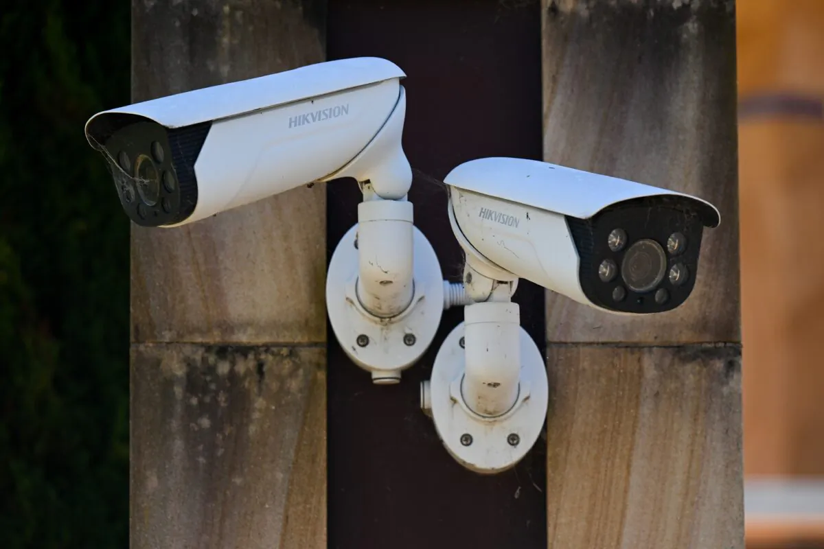 A Hikvision CCTV security camera is seen at a building in Canberra on Feb. 15, 2023. (AAP Image/Lukas Coch) 
