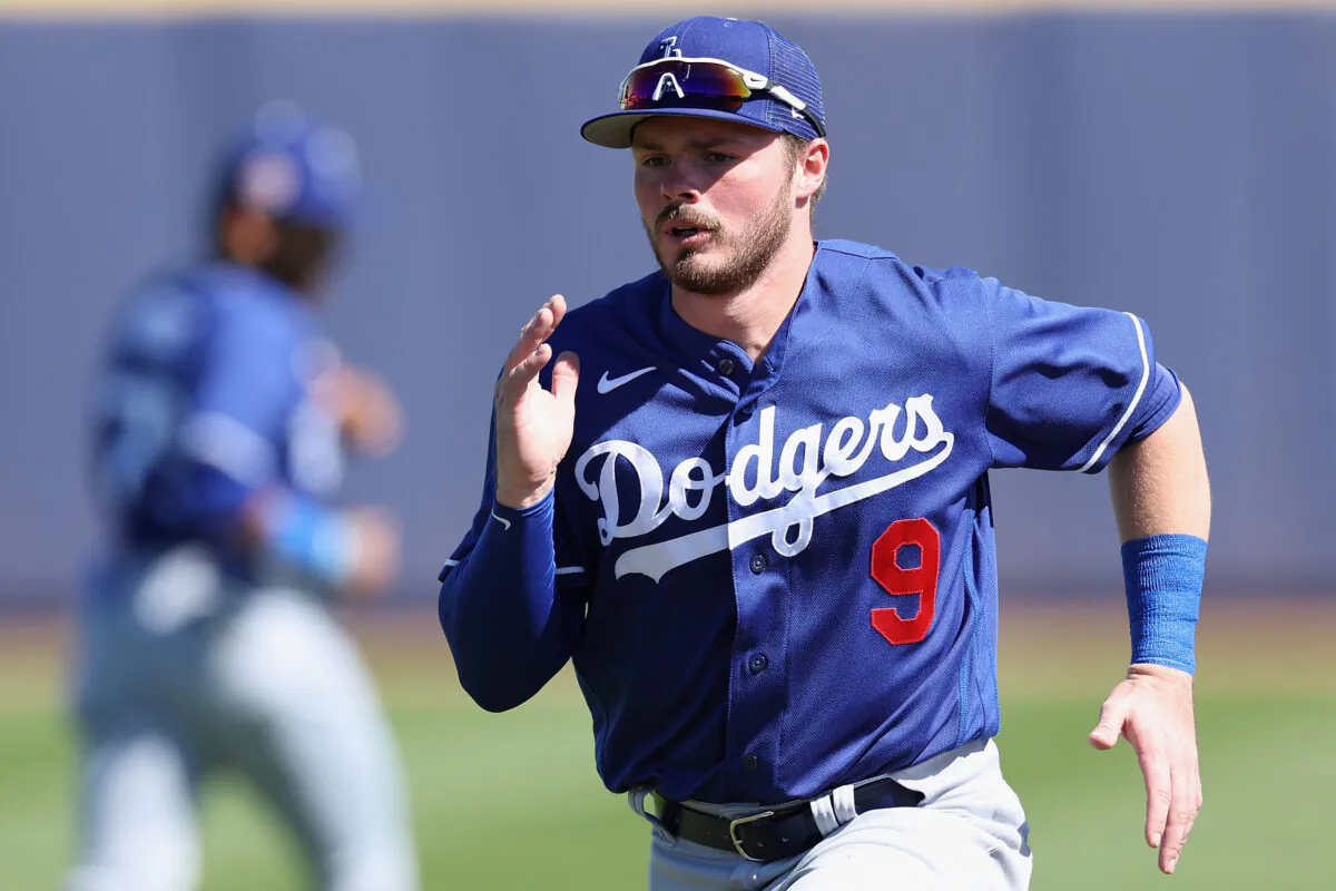 Gavin Lux (9) of the Los Angeles Dodgers warms up before the spring training game against the San Diego Padres at Peoria Stadium in Phoenix, on Feb. 27, 2023. (Christian Petersen/Getty Images)