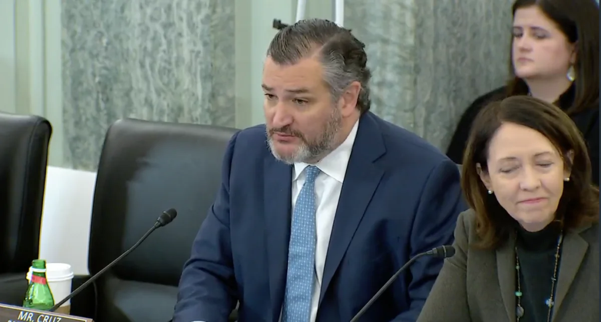Sen. Ted Cruz (R-Texas) raises concerns about Phillip Washington, nominee to head the Federal Aviation Administration, as Sen. Maria Cantwell (D-Wash.), committee chair, reacts during a U.S. Senate hearing in Washington, on March 1, 2023. (Janice Hisle/The Epoch Times via video screenshot)