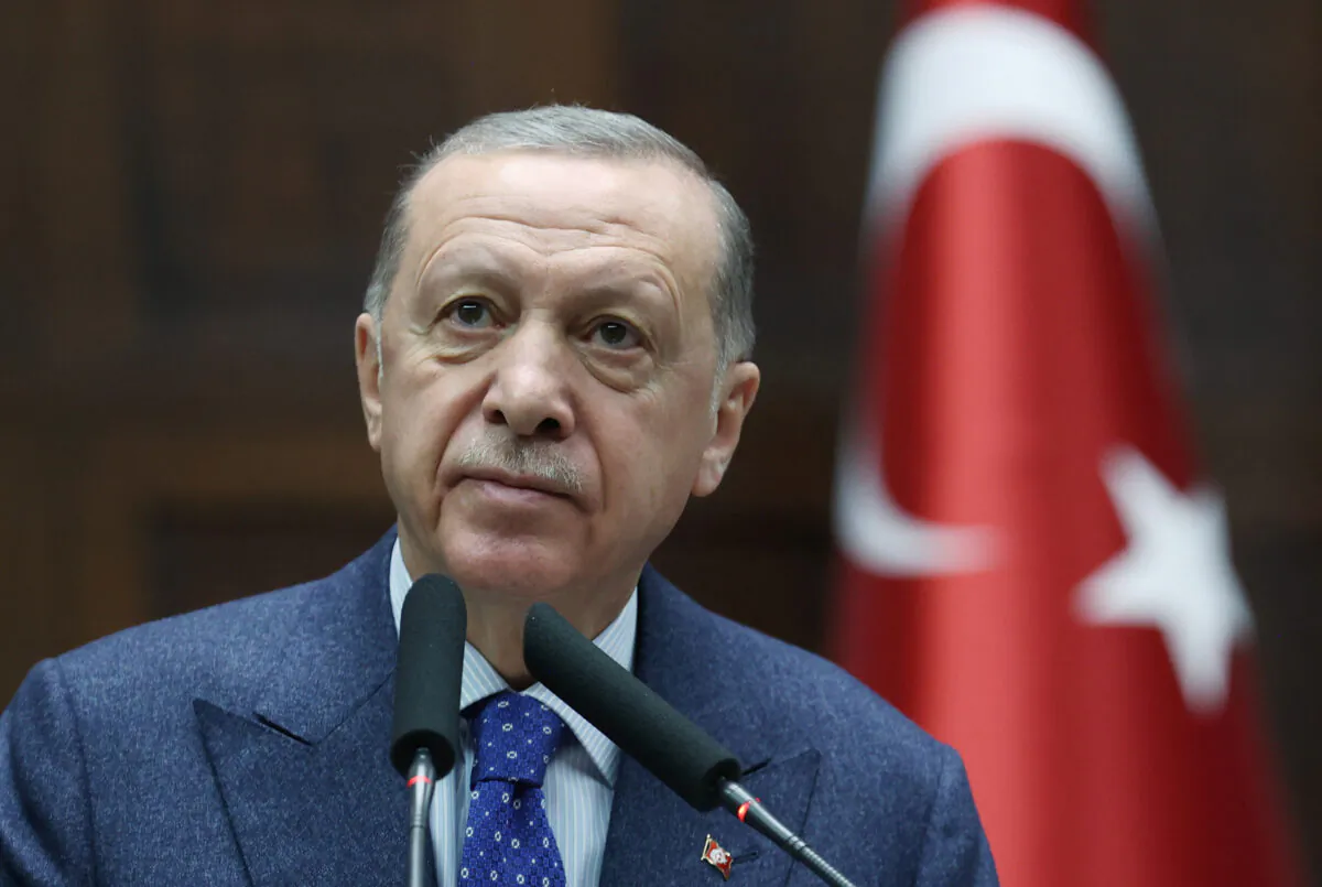 Turkish President Tayyip Erdogan addresses lawmakers of his ruling AK Party during a meeting at the parliament in Ankara, Turkey, on Feb. 1, 2023. (Presidential Press Office/Handout via Reuters)