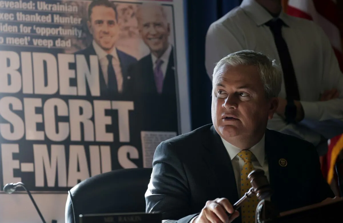 With a poster of a New York Post front page story about Hunter Biden's emails on display, Committee Chairman Rep. James Comer (R-Ky.) announces a recess because of a power outage during a hearing before the House Oversight and Accountability Committee at Rayburn House Office Building on Capitol Hill in Washington on Feb. 8, 2023. (Alex Wong/Getty Images)