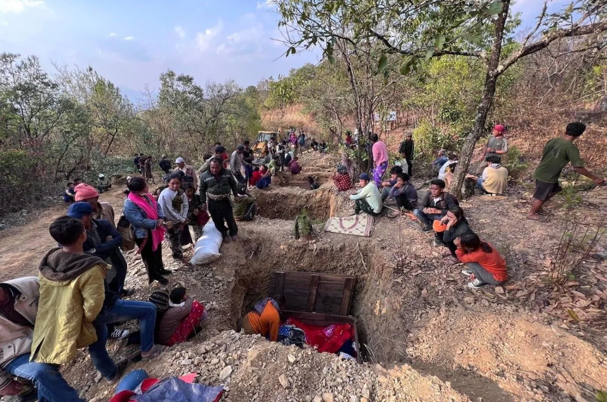 Villagers gathered to mourn the victims who were killed in a junta airstrike in the Khuafo village, located north of the Chin State town of Thantlang, Burma, on March. 30, 2023. (Free Burma Rangers)