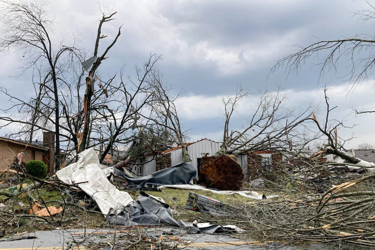 A home is damaged and trees are down after a tornado swept through Little Rock, Ark., on March 31, 2023. (Andrew DeMillo/AP Photo)