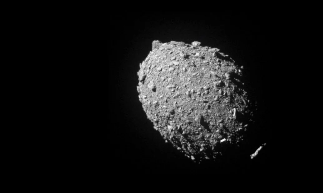 Asteroid moonlet Dimorphos as seen by the DART spacecraft 11 seconds before impact in this image taken by DART’s on board DRACO imager from a distance of 68 kilometers, and released on Sept. 26, 2022. (NASA/Johns Hopkins APL/Handout via Reuters)