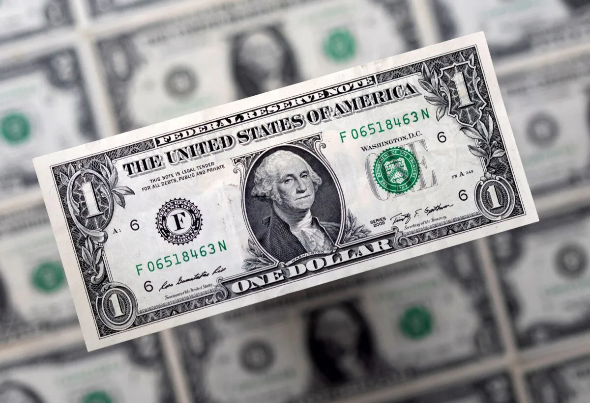 U.S. dollar banknotes on Feb. 14, 2022. (Dado Ruvic/Illustration/Reuters)