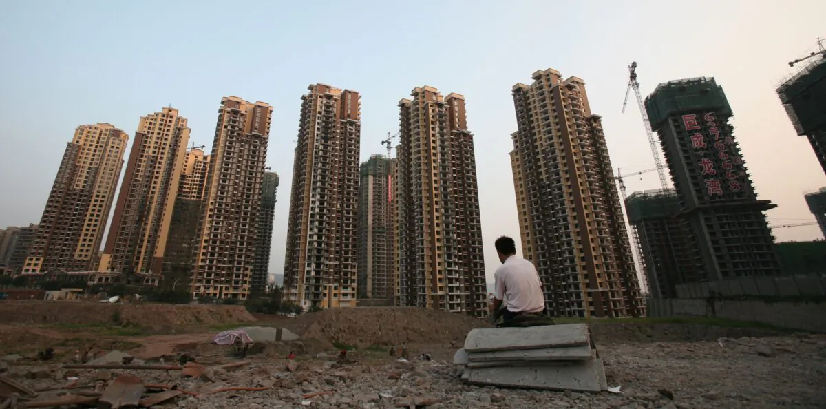Buildings under construction near the People's Bank of China office building in Chongqing, China, on Sept. 29, 2007. (China Photos/Getty Images)