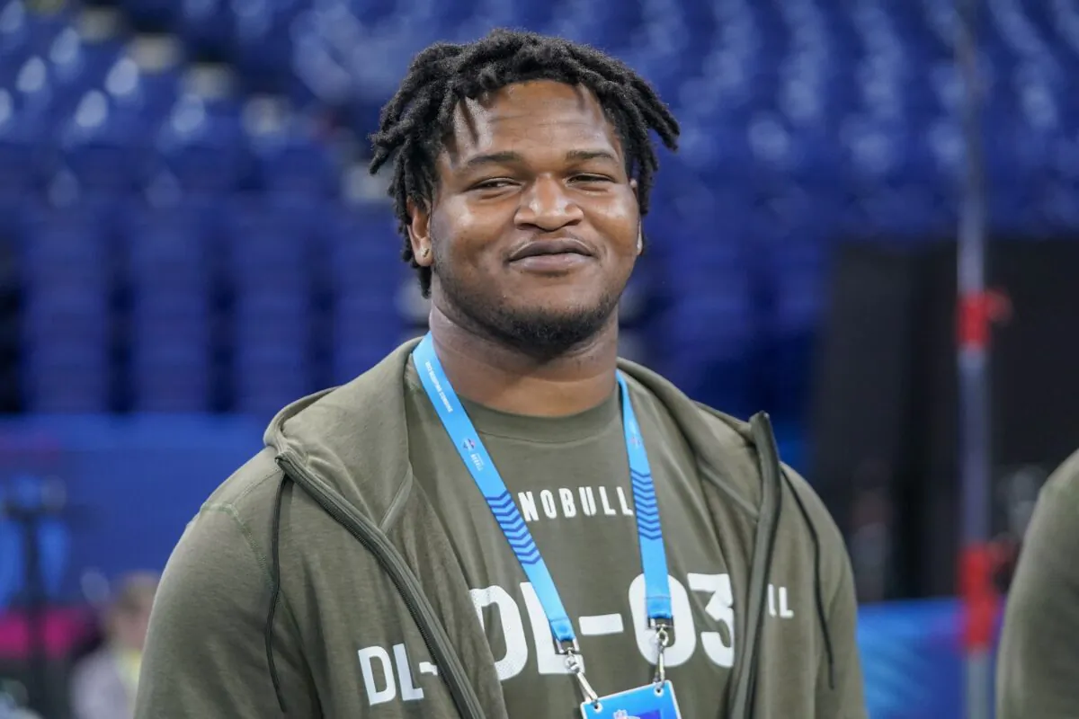 Georgia defensive lineman Jalen Carter watches as players warm up on the field before the NFL football scouting combine in Indianapolis on March 2, 2023. (Darron Cummings/AP Photo)