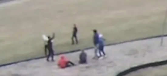 A screenshot from video released by the school district in Springfield, Ohio, which reportedly shows black students celebrating after assaulting white students and forcing them to kneel on the ground and say "black lives matter." (Springfield, Ohio School District)