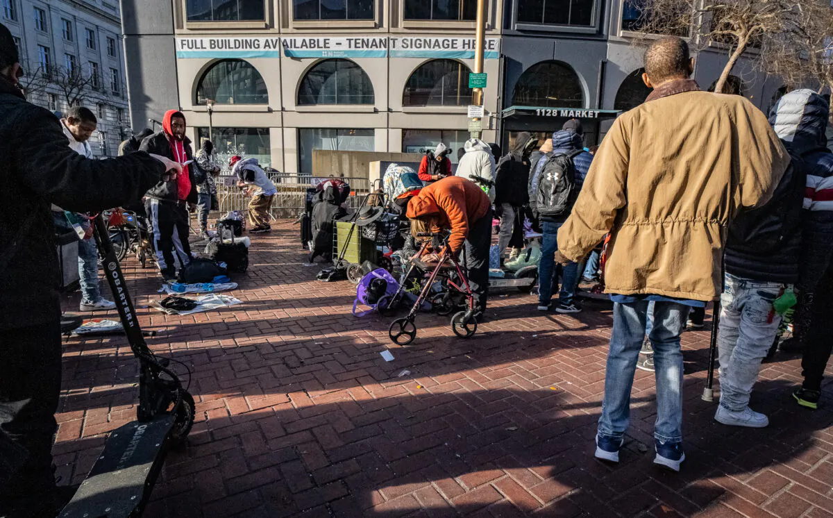 Homeless people in the Tenderloin District of San Francisco on Feb. 22, 2023. (John Fredricks/The Epoch Times)