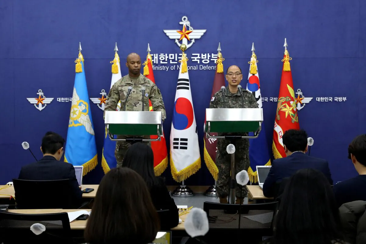 Col. Isaac Taylor of the U.N. Command (UNC), Combined Forces Command (CFC), and United States Forces Korea (USFK) and Col. Lee Sung-jun (R) of South Korea's Joint Chiefs of Staff attend the press briefing of 2023 Freedom Shield Exercise at the Defense Ministry in Seoul, South Korea, on March 3, 2023. (Chung Sung-Jun/Pool via Reuters)